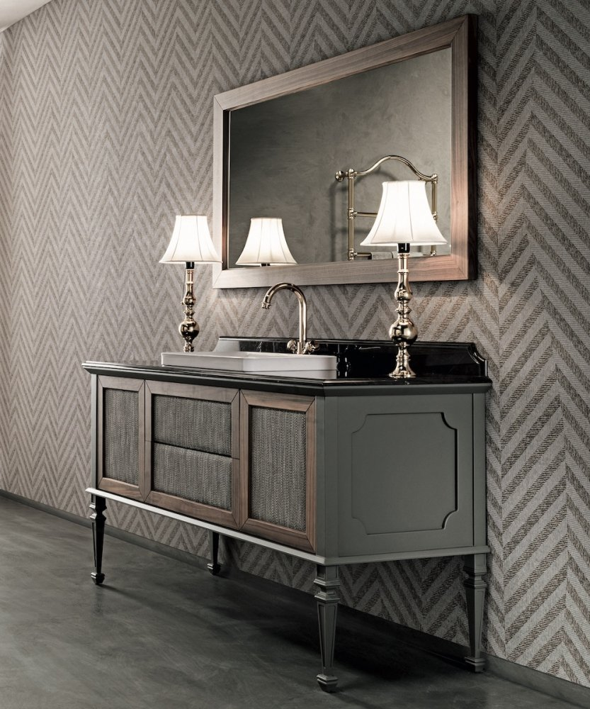 Exkluzivní koupelnová skříňka Gaia Mobili s čelem z ořechu Canaletto a prošívanou látkou. Unikátní italský design kombinující dřevo a textil pro luxusní koupelny, ASSO Praha.